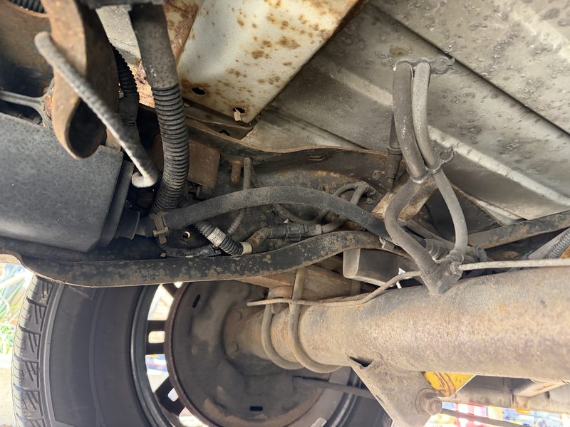 Rear suspension leaf spring and undercarriage components