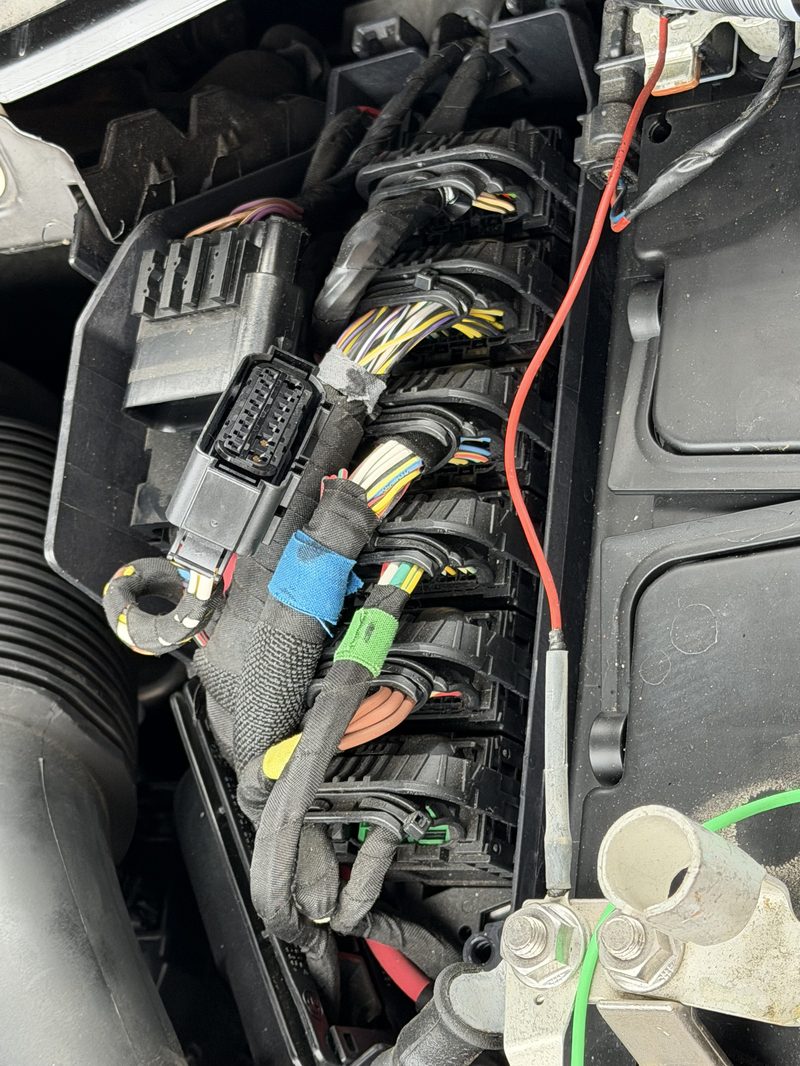 Engine wiring harness connectors organized during engine service